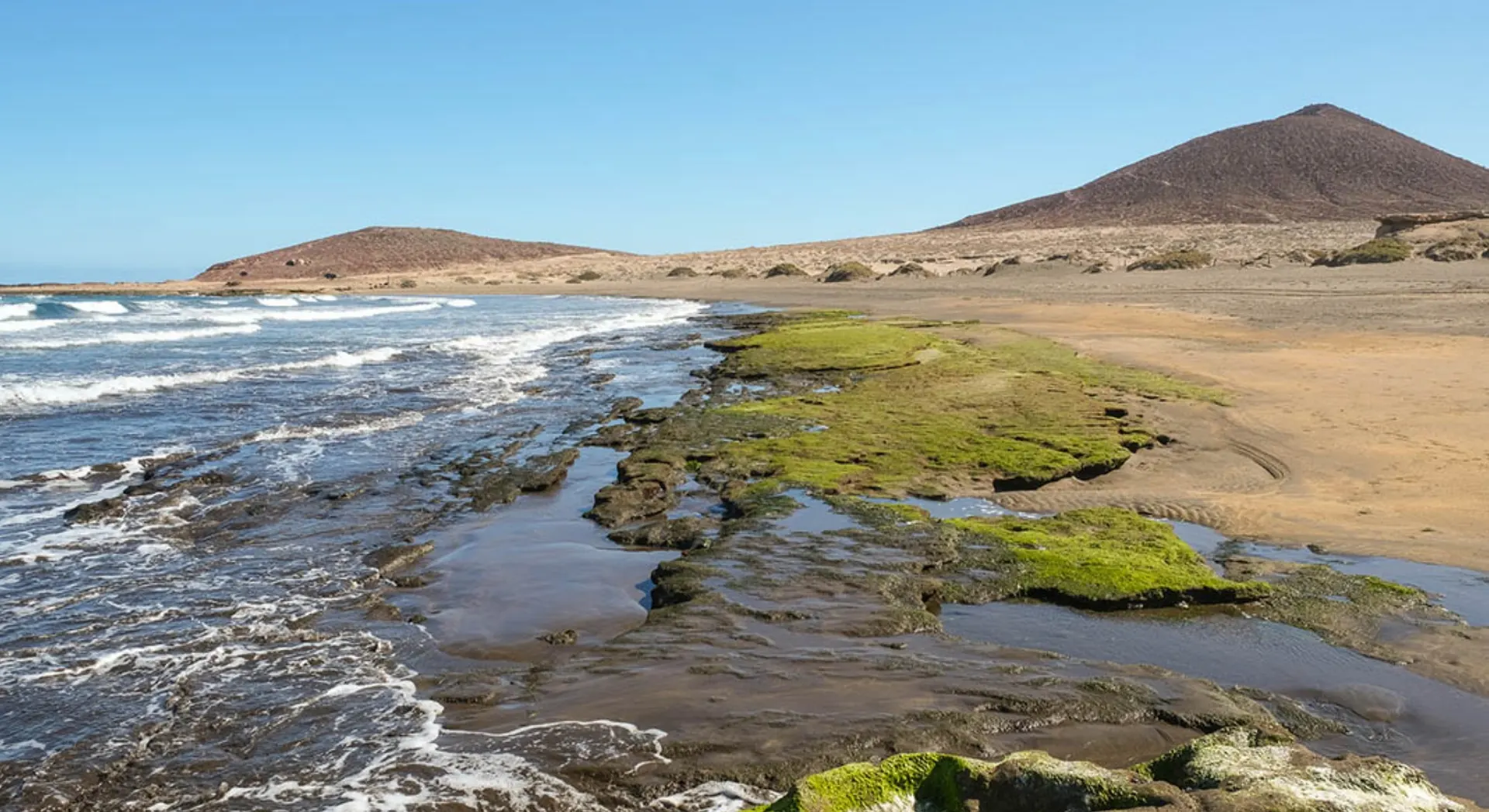 Gezeitentümpel neben Montaña Roja am Playa de Montaña Roja, El Médano.